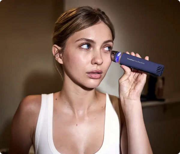 TheraFace Depuffing Wand – Facial Massage Tool – Therabody UAE