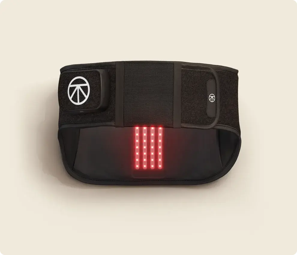 Therabody ThermBack LED wearable lower back wrap with infrared LEDs illuminated